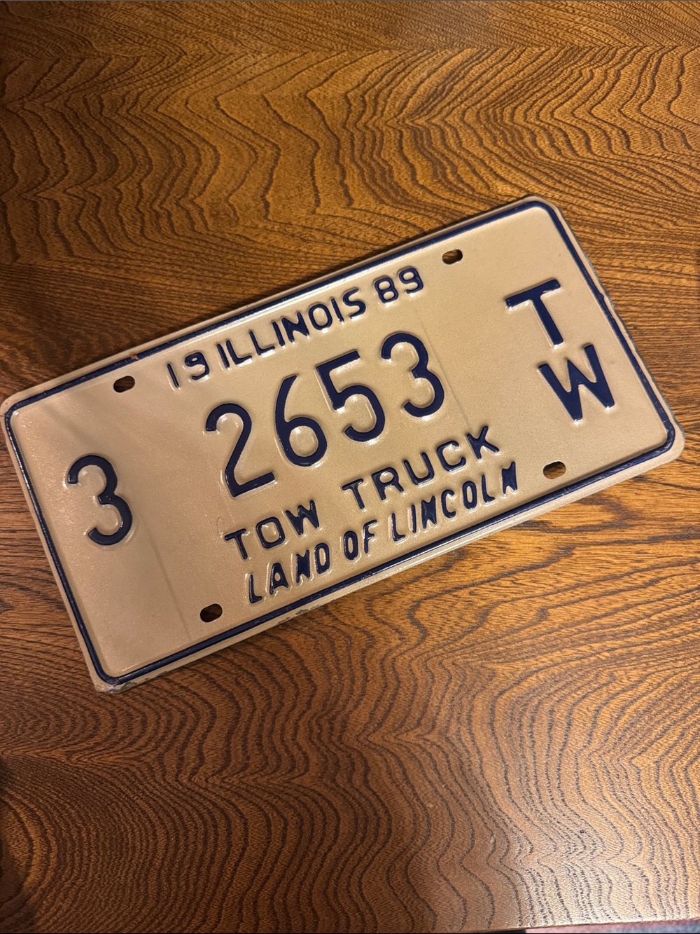 VTG Illinois Steel Cream and Navy Tow Truck License Plate 1989 Land of Lincoln